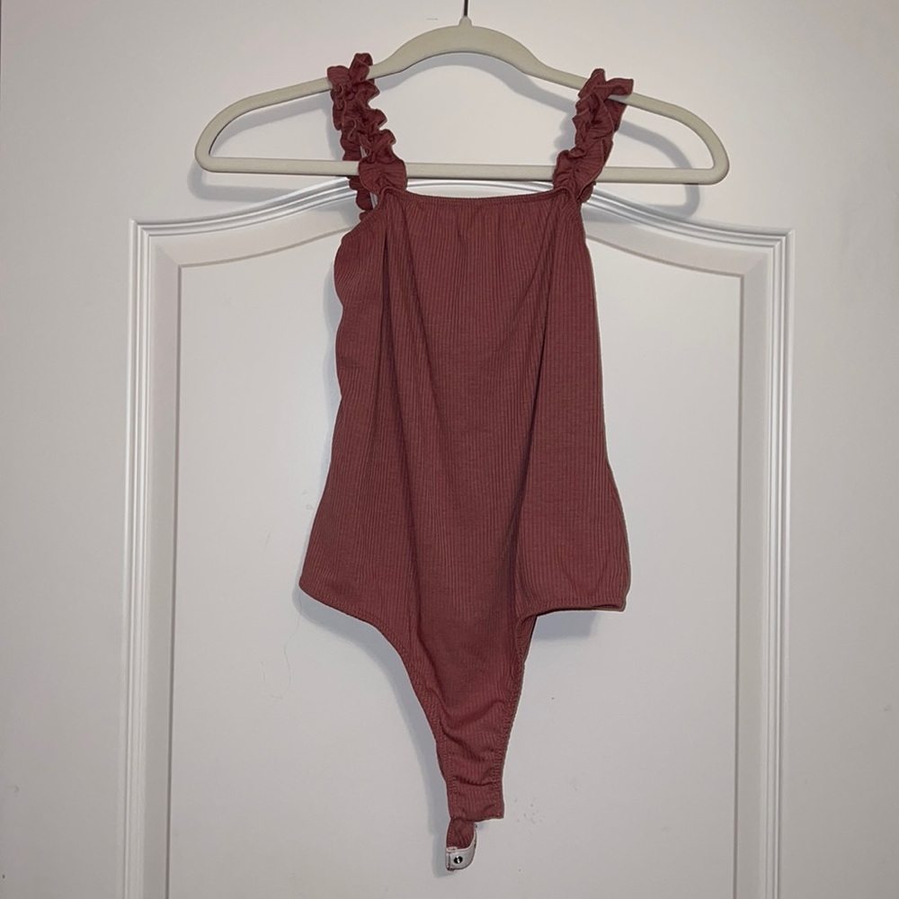 Pink bodysuit